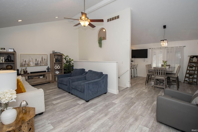 living room with vaulted ceiling with beams, recessed lighting, visible vents, light wood-style flooring, and ceiling fan