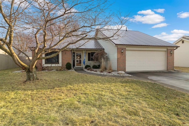 ranch-style house featuring driveway, metal roof, an attached garage, a front yard, and brick siding