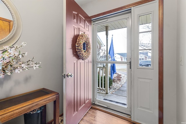 doorway with light wood-style flooring