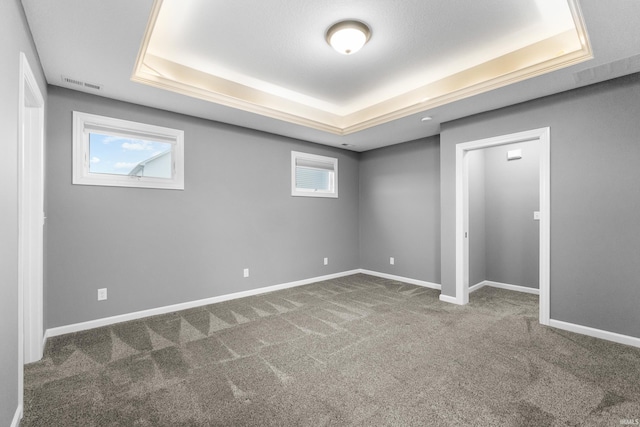 interior space featuring carpet, visible vents, and baseboards