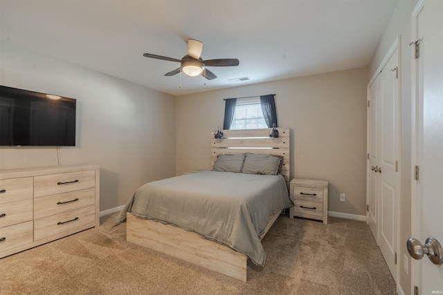 bedroom featuring carpet floors, baseboards, and visible vents