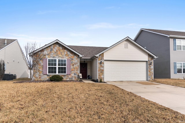 view of front of property featuring a front lawn, stone siding, driveway, and an attached garage