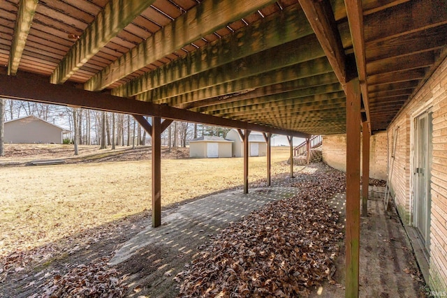 view of yard featuring stairway, a storage unit, and an outdoor structure