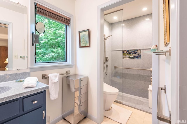 bathroom with toilet, tile patterned flooring, vanity, a shower stall, and recessed lighting