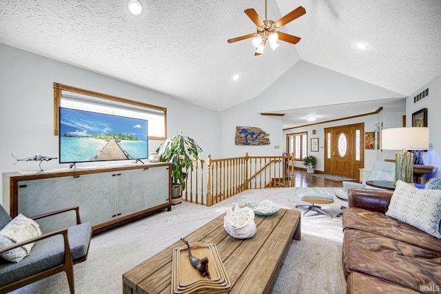 carpeted living area featuring a ceiling fan, visible vents, recessed lighting, vaulted ceiling, and a textured ceiling