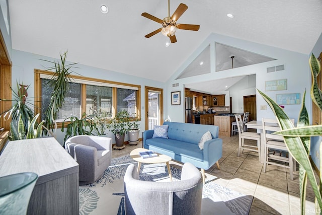 living room with visible vents, high vaulted ceiling, a ceiling fan, recessed lighting, and light tile patterned floors