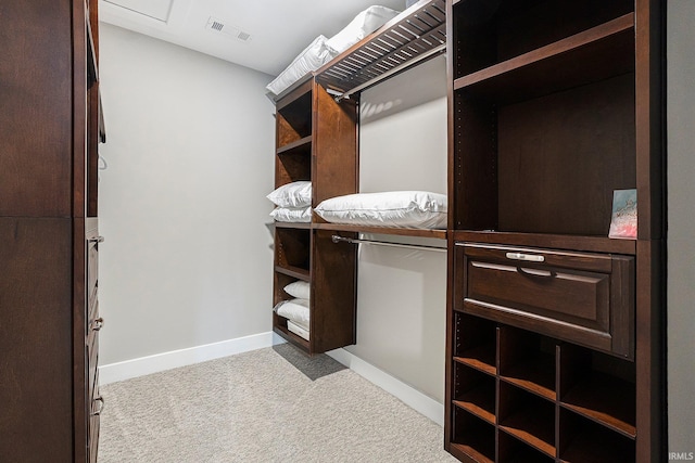 walk in closet with carpet and visible vents