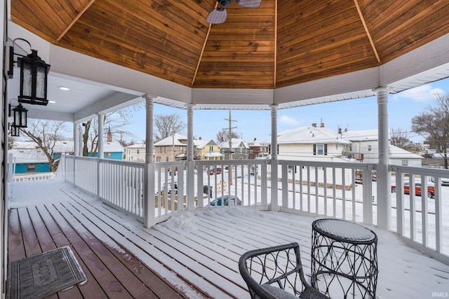 wooden deck featuring a gazebo and a residential view