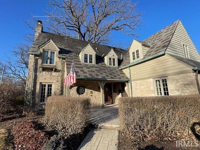 view of front facade featuring stone siding