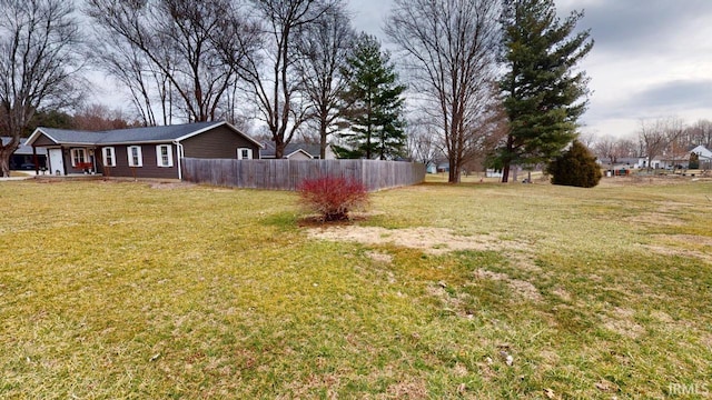 view of yard featuring fence