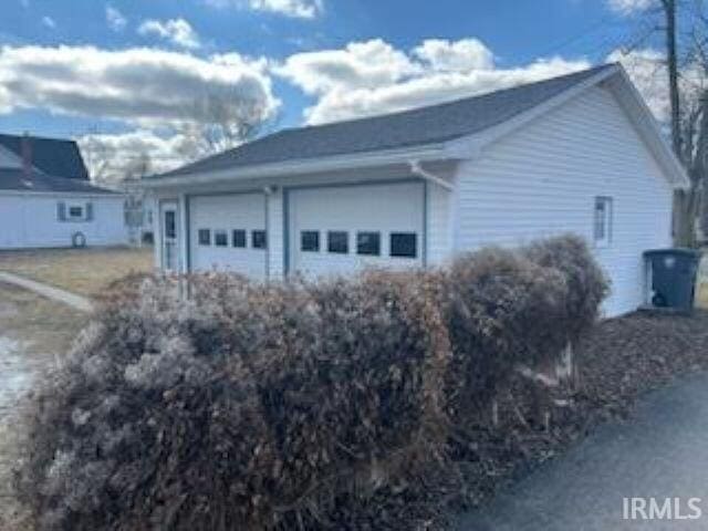 view of home's exterior with a garage