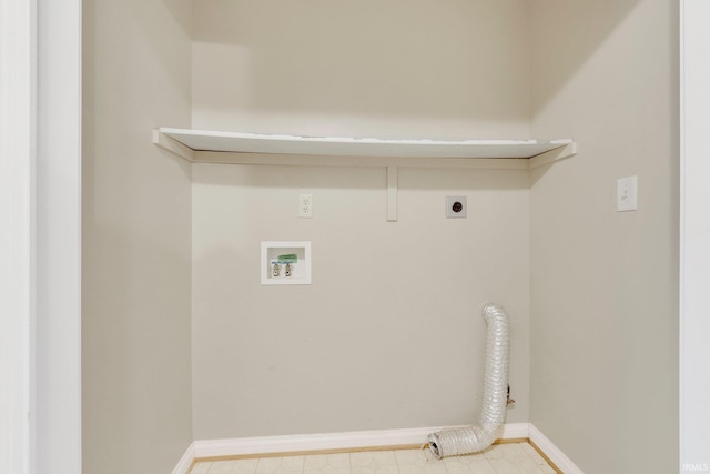 laundry area featuring baseboards, laundry area, hookup for a washing machine, and hookup for an electric dryer