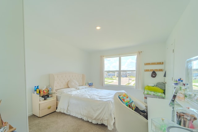 carpeted bedroom featuring recessed lighting