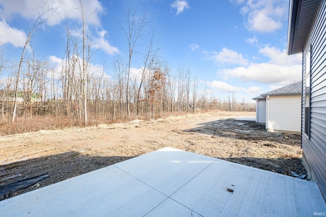 view of yard with a patio area