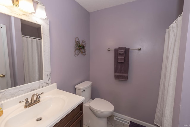 full bathroom featuring tile patterned flooring, toilet, vanity, visible vents, and baseboards