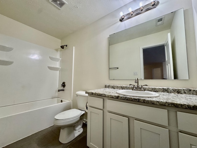 bathroom with toilet, tile patterned flooring, visible vents, and vanity