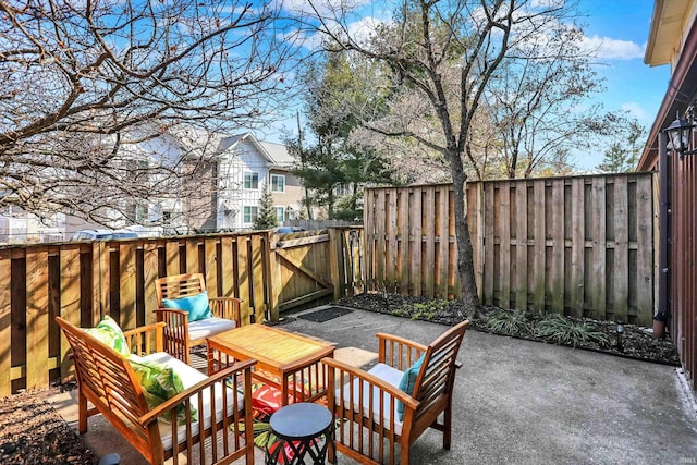 view of patio / terrace featuring a fenced backyard and outdoor lounge area