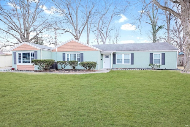 ranch-style house with a front lawn