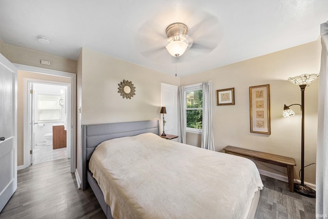 bedroom with wood finished floors, a ceiling fan, and baseboards