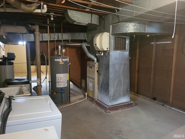 utilities featuring washer / dryer and gas water heater