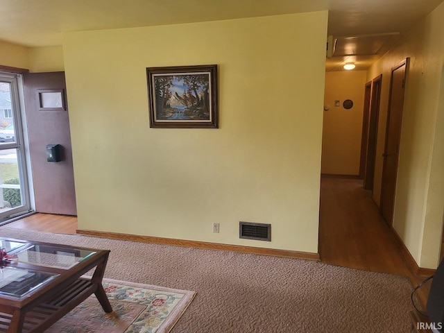 interior space featuring visible vents and baseboards