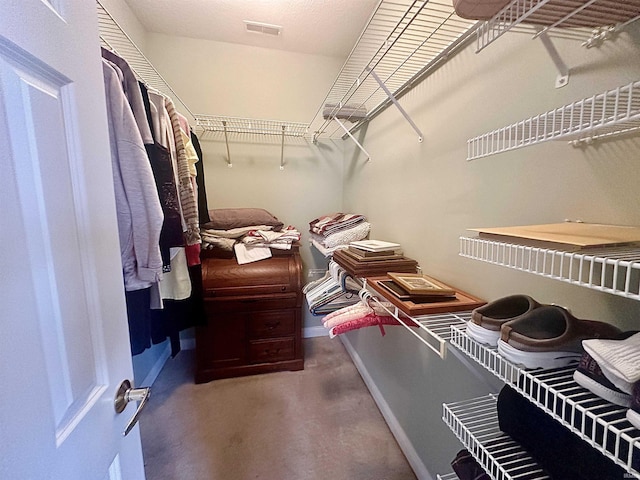 walk in closet with visible vents