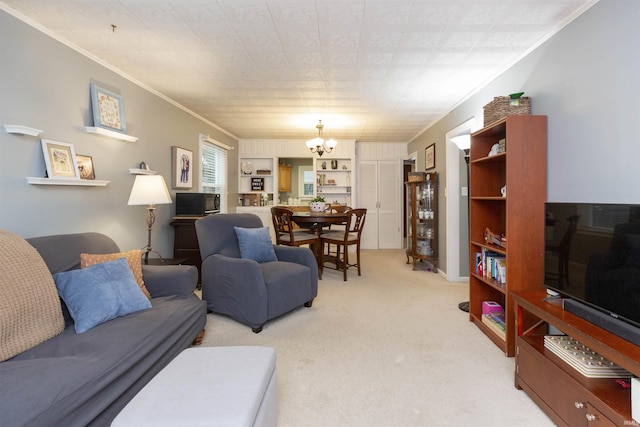 living room with light carpet, ornamental molding, and an inviting chandelier