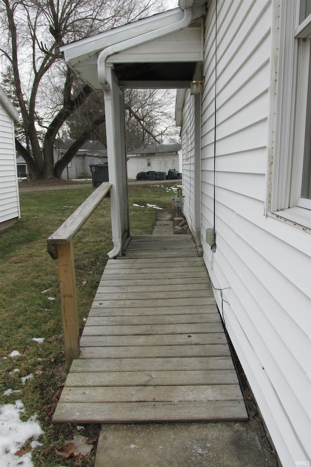 deck featuring a lawn