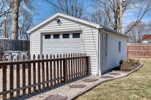 detached garage with fence