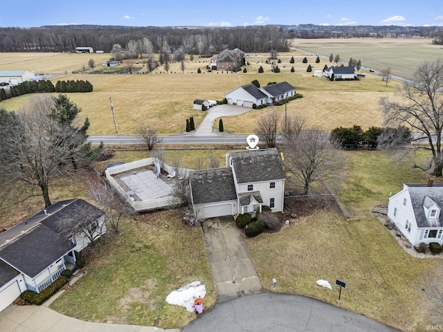 birds eye view of property featuring a rural view