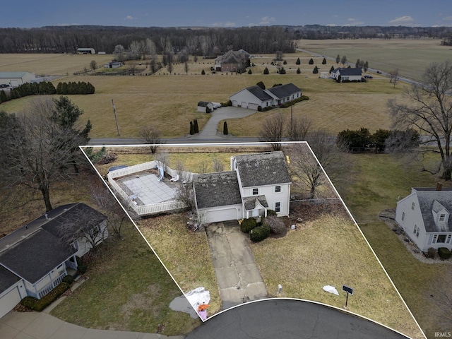 birds eye view of property featuring a rural view