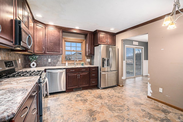 kitchen featuring stainless steel appliances, tasteful backsplash, a sink, dark brown cabinets, and baseboards