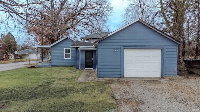 ranch-style home with an attached garage and a front yard