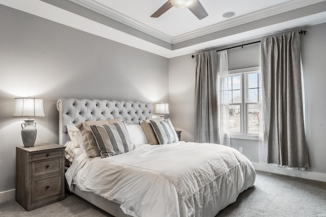 bedroom featuring a ceiling fan, carpet, and crown molding