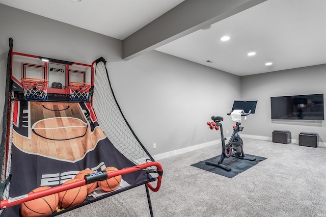 exercise area featuring recessed lighting, carpet flooring, visible vents, and baseboards