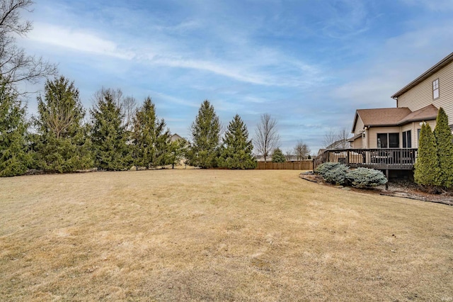 view of yard with a deck