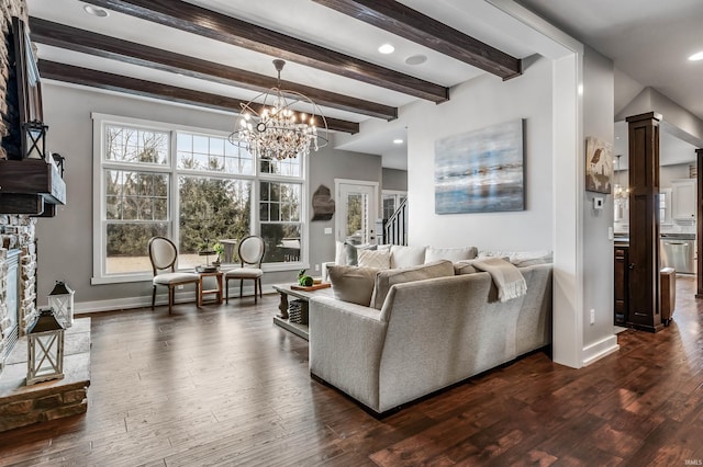 living room featuring a fireplace, stairway, dark wood-type flooring, beamed ceiling, and baseboards