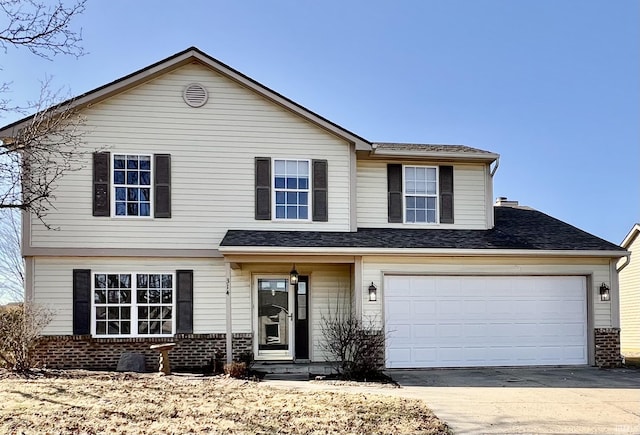 view of front of home featuring entry steps, a shingled roof, concrete driveway, and brick siding