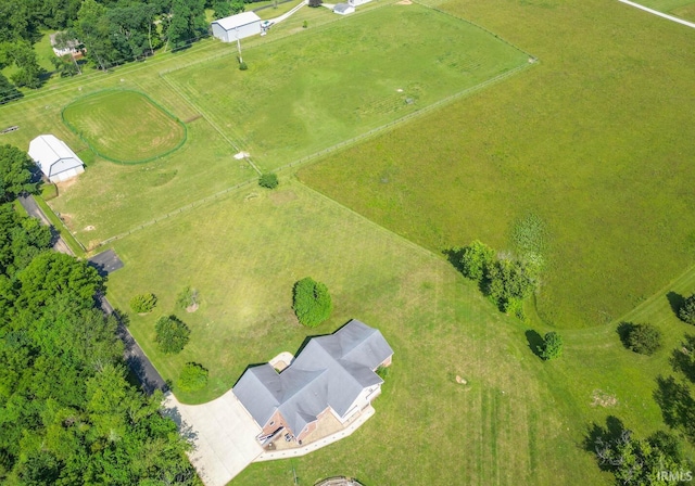 birds eye view of property featuring a rural view