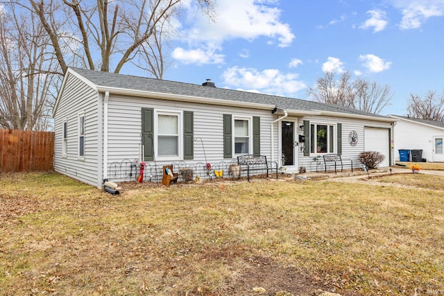 ranch-style home with a front lawn, roof with shingles, an attached garage, and fence