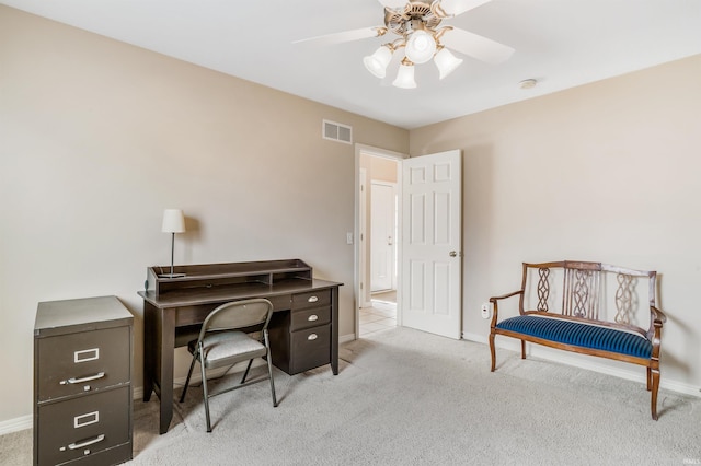 office with carpet, visible vents, ceiling fan, and baseboards