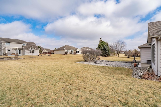 view of yard with a residential view