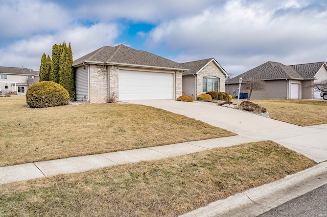 ranch-style home with a garage, concrete driveway, a front lawn, and brick siding