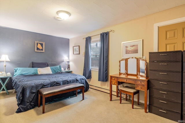 bedroom with light carpet and baseboard heating