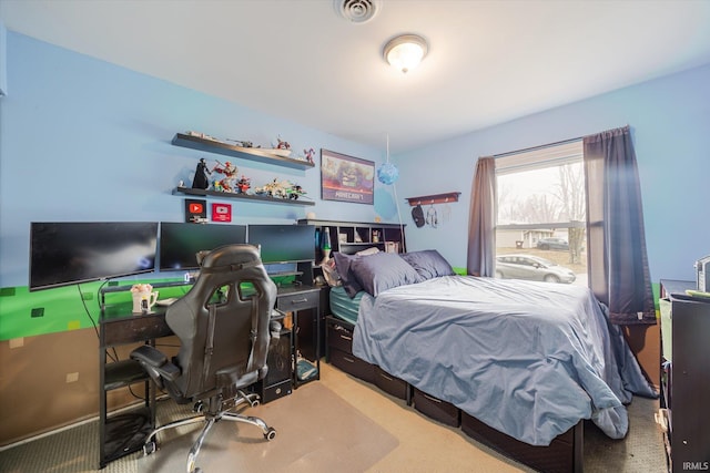 bedroom featuring carpet floors and visible vents