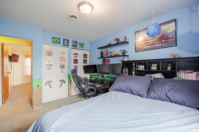 carpeted bedroom with visible vents