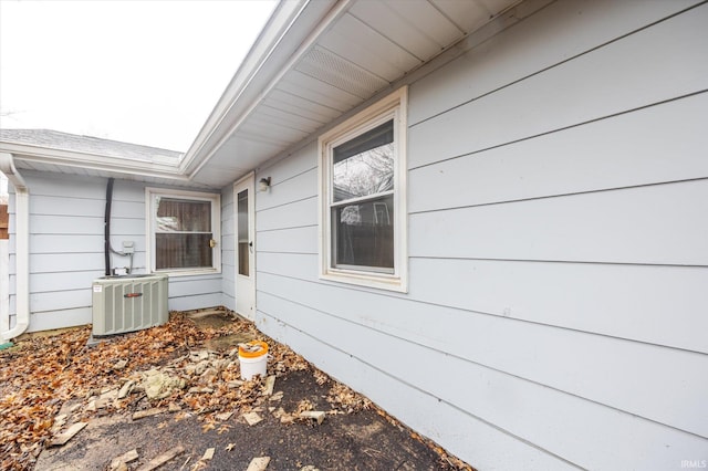 view of side of property featuring cooling unit