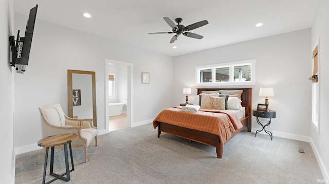 bedroom featuring baseboards, a ceiling fan, light colored carpet, connected bathroom, and recessed lighting