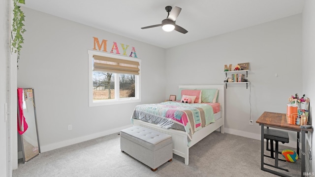 bedroom with carpet, ceiling fan, and baseboards