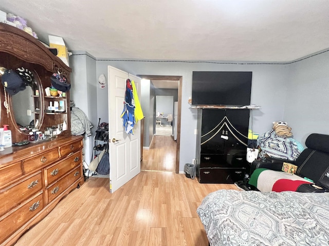 bedroom with light wood-style flooring